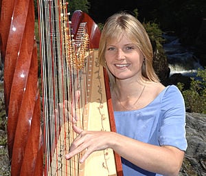 Georgina Cornock playing harp